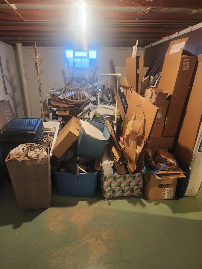 Roll-off dumpster container at job site for 15 Yard Dumpster Rental in Mount Carmel